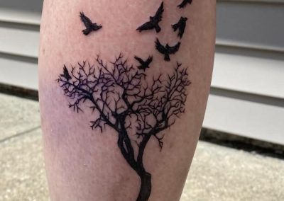 Tree and birds tattoo
